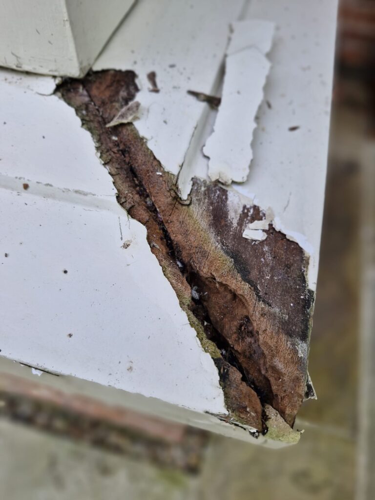 Before works carried out at DCM Decorating on window sill woodwork